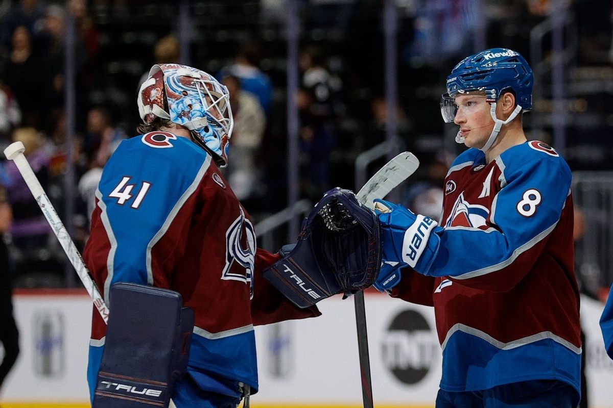 Nov 11, 2025; Denver, Colorado, USA; Colorado Avalanche goaltender Scott Wedgewood (41) celebrates with defenseman Cale Makar (8) after the game against the Anaheim Ducks at Ball Arena. Mandatory Credit: Isaiah J. Downing-Imagn Images