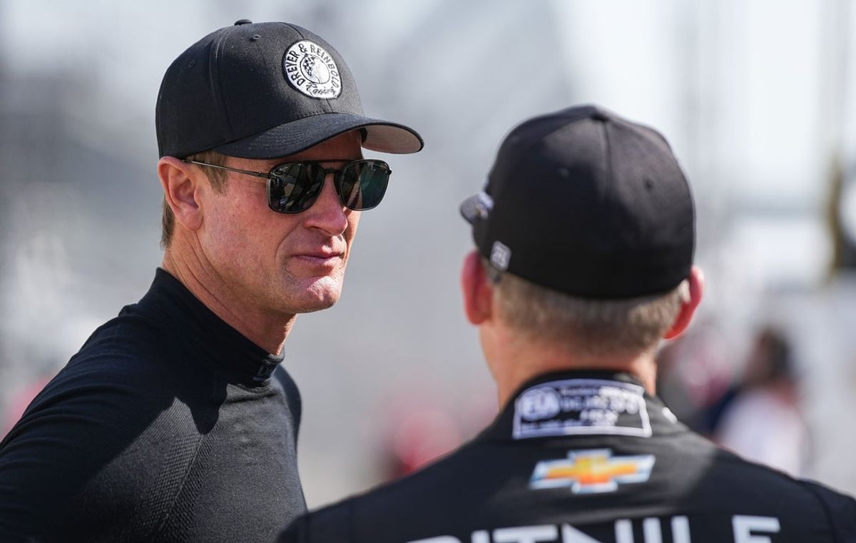 Dreyer & Reinbold Racing driver Ryan Hunter-Reay (23) talks to Ed Carpenter Racing driver Ed Carpenter (33) during open test practice in preparation for the 107th running of the Indianapolis 500 on Thursday, April 20, 2023 at the Indianapolis Motor Speedway in Indianapolis.