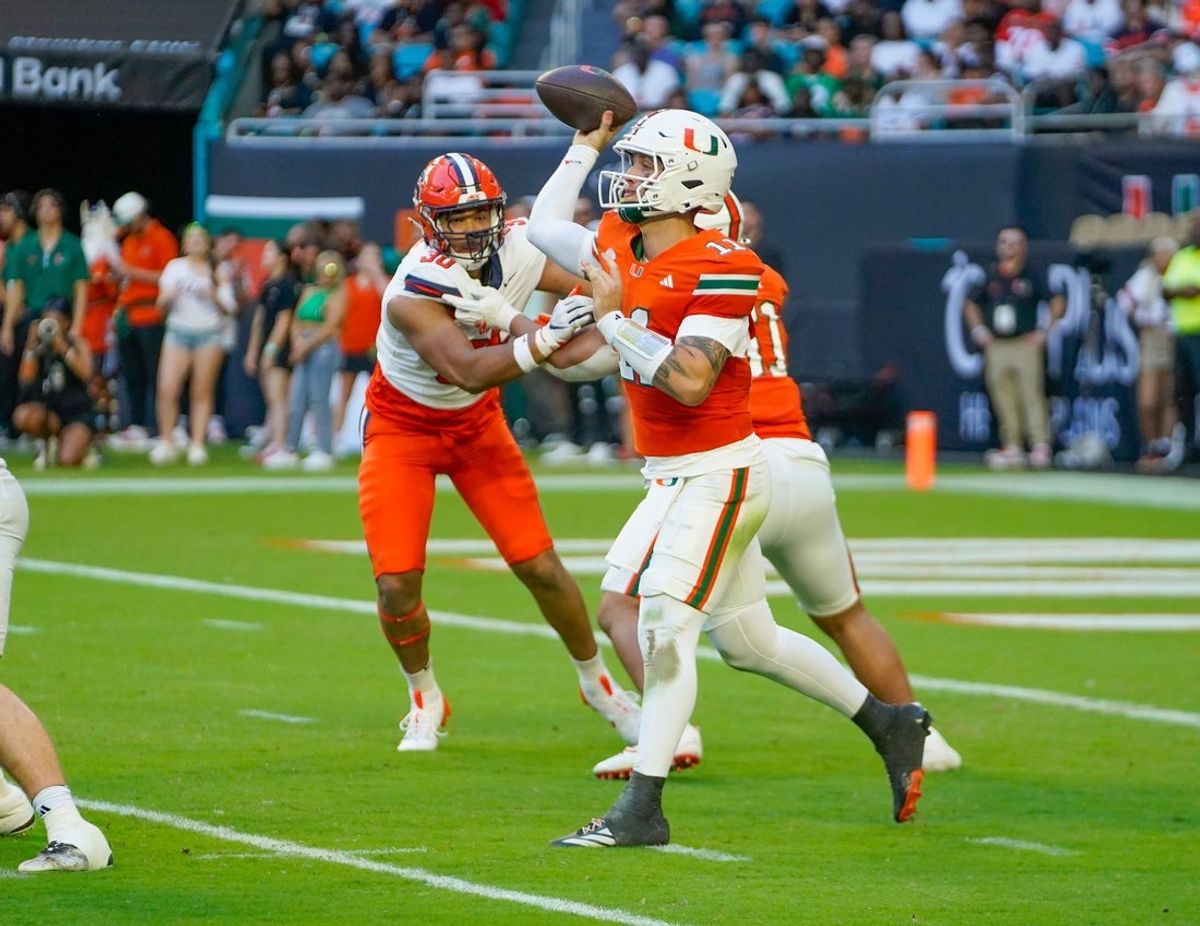 Nov 8, 2025; Miami Gardens, Florida, USA; Miami Hurricanes quarterback Carson Beck (11) passes against the Syracuse Orange during the second quarter at Hard Rock Stadium. Mandatory Credit: Jeff Romance-Imagn Images