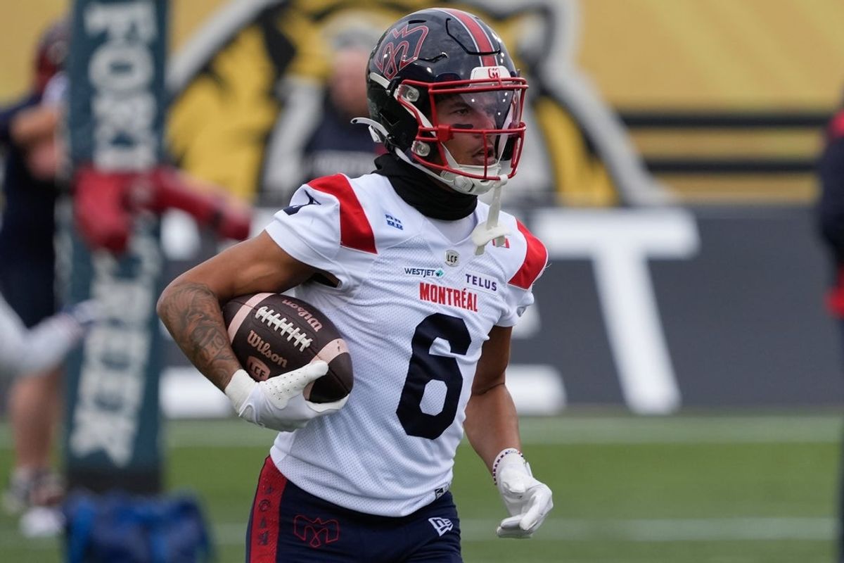 Nov 8, 2025; Hamilton, Ontario, Canada; Montreal Alouettes wide receiver Tyson Philpot (6) runs with the football during warm up before the start of the Eastern Final against the Hamilton Tiger-Cats at Hamilton Stadium. Mandatory Credit: John E. Sokolowski-Imagn Images