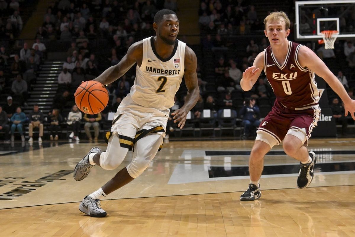 Nov 12, 2025; Nashville, Tennessee, USA;  Vanderbilt Commodores guard Duke Miles (2) drives to the basket against the Eastern Kentucky Colonels during the first half at Memorial Gymnasium. Mandatory Credit: Steve Roberts-Imagn Images