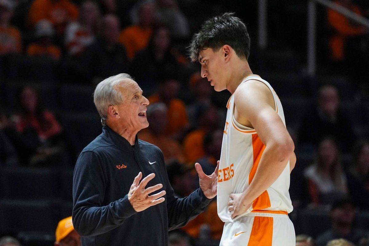 Tennessee coach Rick Barnes speaks with Tennessee forward J.P. Estrella (13) on the sidelines during a NCAA basketball game between Tennessee Volunteers and North Florida Ospreys at Thompson-Boling Arena at Food City Center in Knoxville, Tenn. on Nov. 12, 2025.
