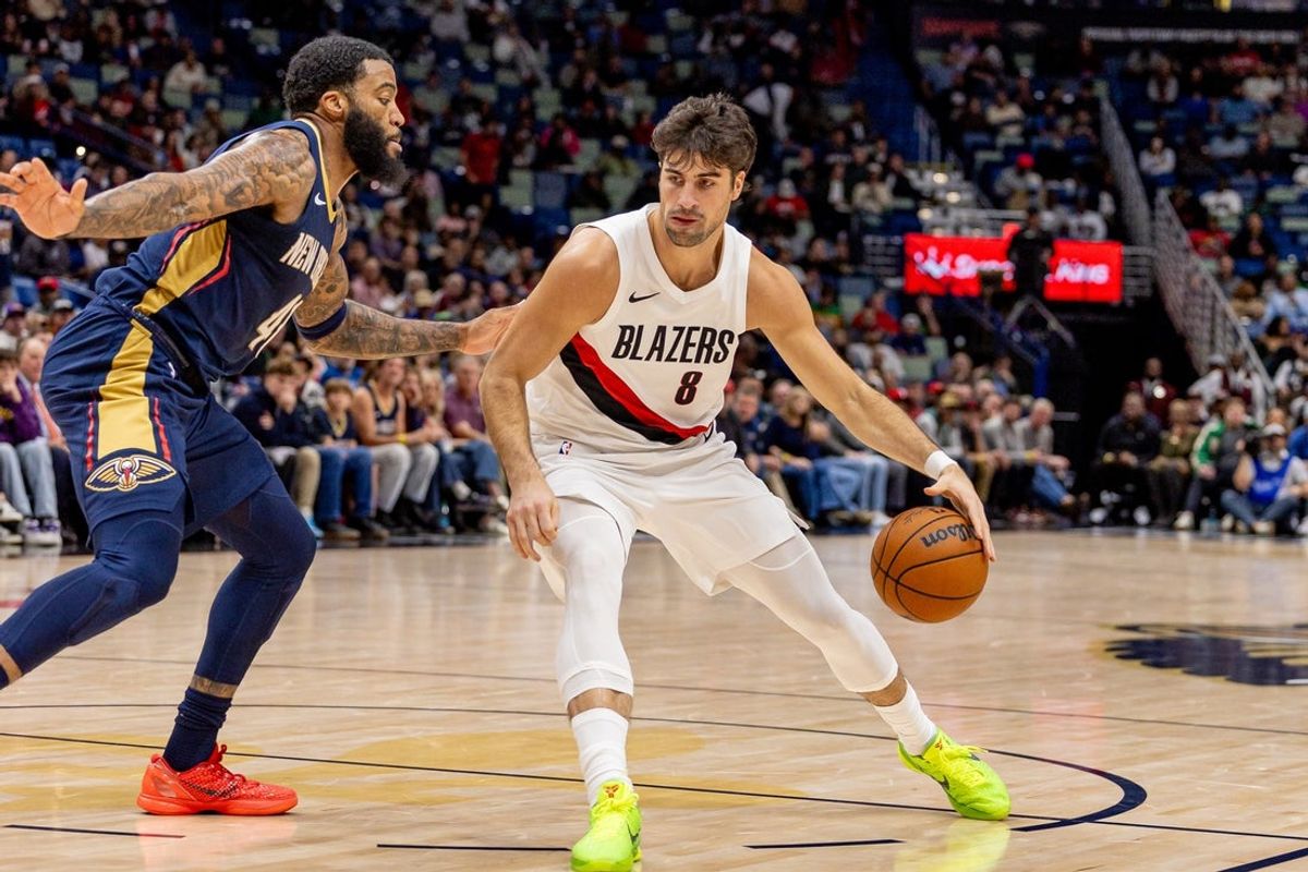 Nov 12, 2025; New Orleans, Louisiana, USA;  Portland Trail Blazers forward Deni Avdija (8) dribbles against New Orleans Pelicans guard/forward Saddiq Bey (41) during the first half at Smoothie King Center. Mandatory Credit: Stephen Lew-Imagn Images