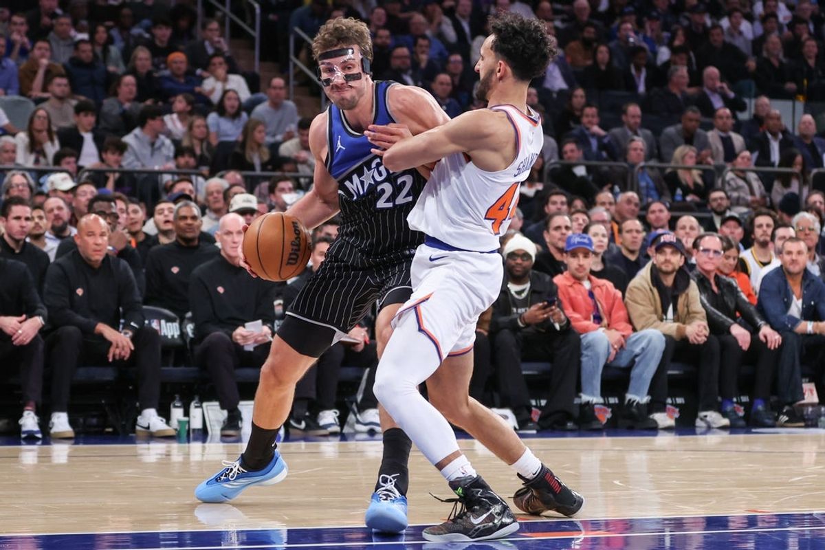 Nov 12, 2025; New York, New York, USA;  Orlando Magic forward Franz Wagner (22) looks to post up against New York Knicks guard Landry Shamet (44) in the fourth quarter at Madison Square Garden. Mandatory Credit: Wendell Cruz-Imagn Images