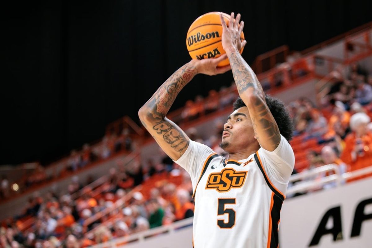 Nov 12, 2025; Stillwater, Oklahoma, USA; Oklahoma State Cowboys guard Vyctorius Miller (5) shoots the ball during the first half against the Prairie View A&M Panthers at Gallagher-Iba Arena. Mandatory Credit: William Purnell-Imagn Images