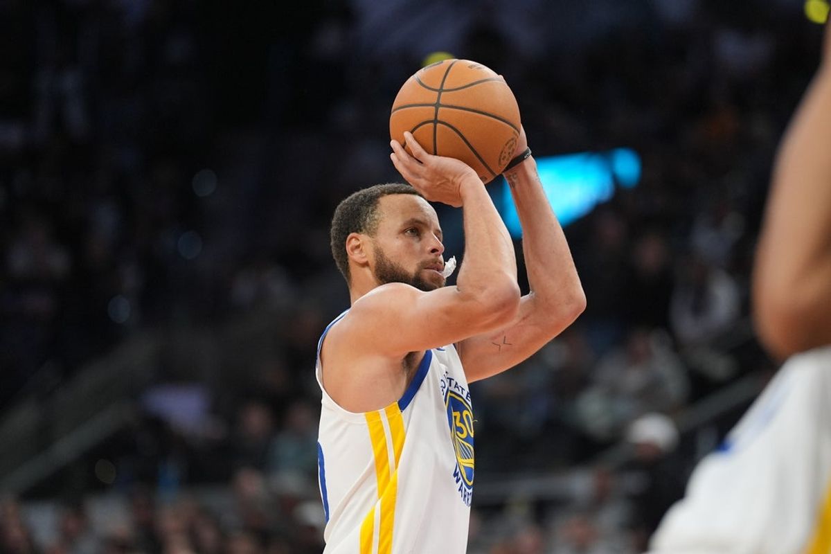 Nov 12, 2025; San Antonio, Texas, USA;  Golden State Warriors guard Stephen Curry (30) shoots in the second half against the San Antonio Spurs at Frost Bank Center. Mandatory Credit: Daniel Dunn-Imagn Images