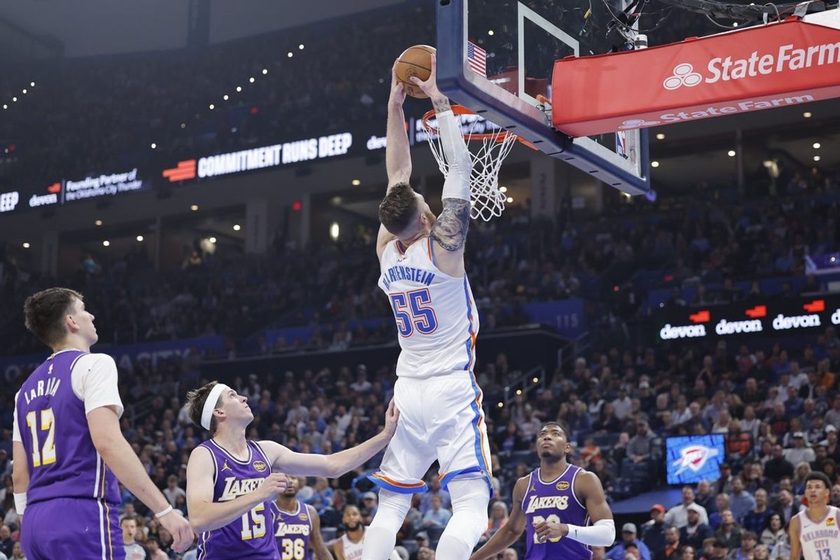 Nov 12, 2025; Oklahoma City, Oklahoma, USA; Oklahoma City Thunder center Isaiah Hartenstein (55) dunks against the Los Angeles Lakers during the second quarter at Paycom Center. Mandatory Credit: Alonzo Adams-Imagn Images