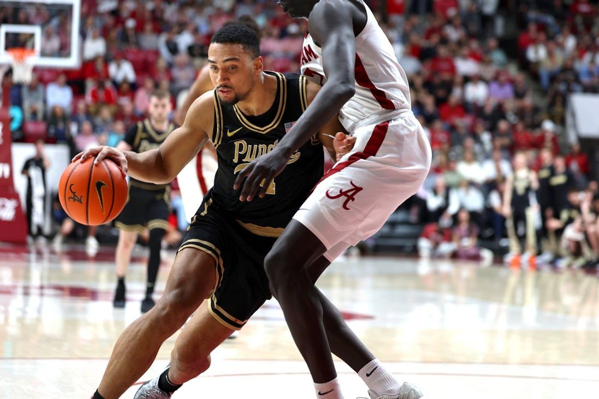 Nov 13, 2025; Tuscaloosa, Alabama, USA; Purdue Boilermakers forward Trey Kaufman-Renn (4) drives to the basket during the first half against the Alabama Crimson Tide at Coleman Coliseum. Mandatory Credit: David Leong-Imagn Images