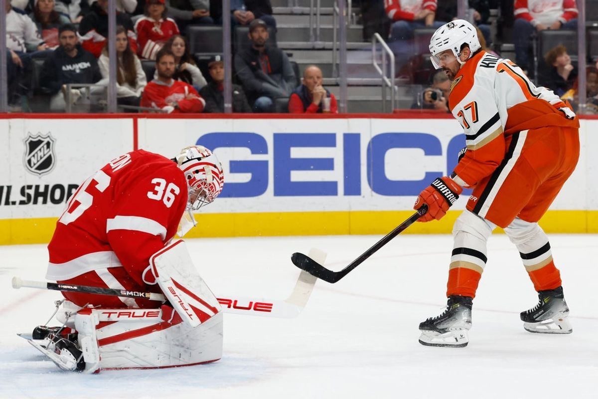 Nov 13, 2025; Detroit, Michigan, USA;  Detroit Red Wings goaltender John Gibson (36) makes the save on Anaheim Ducks left wing Alex Killorn (17) in the first period at Little Caesars Arena. Mandatory Credit: Rick Osentoski-Imagn Images