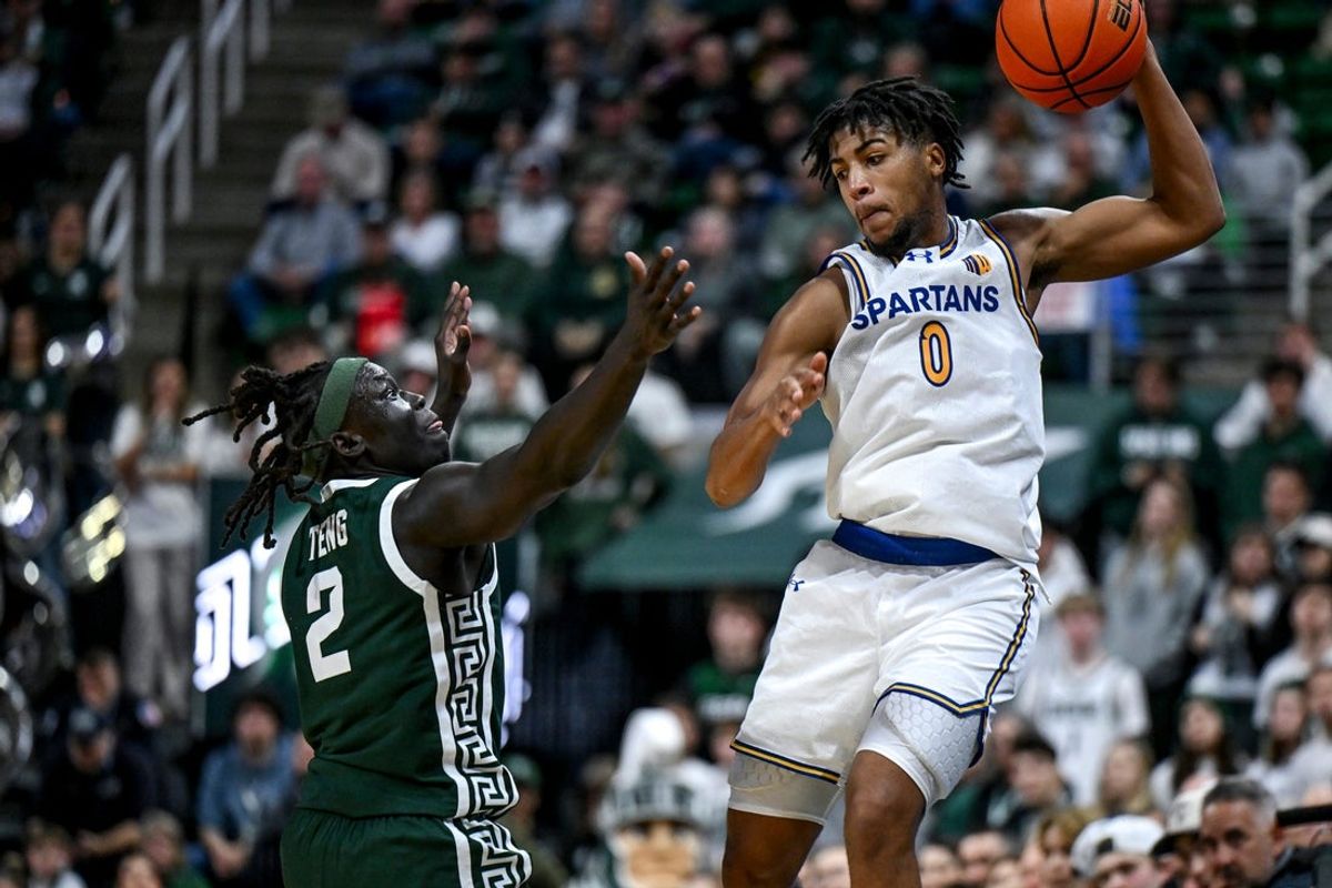 Michigan State's Kur Teng, left, pressures San Jose State's Colby Garland during the second half on Thursday, Nov. 13, 2025, at the Breslin Center in East Lansing.
