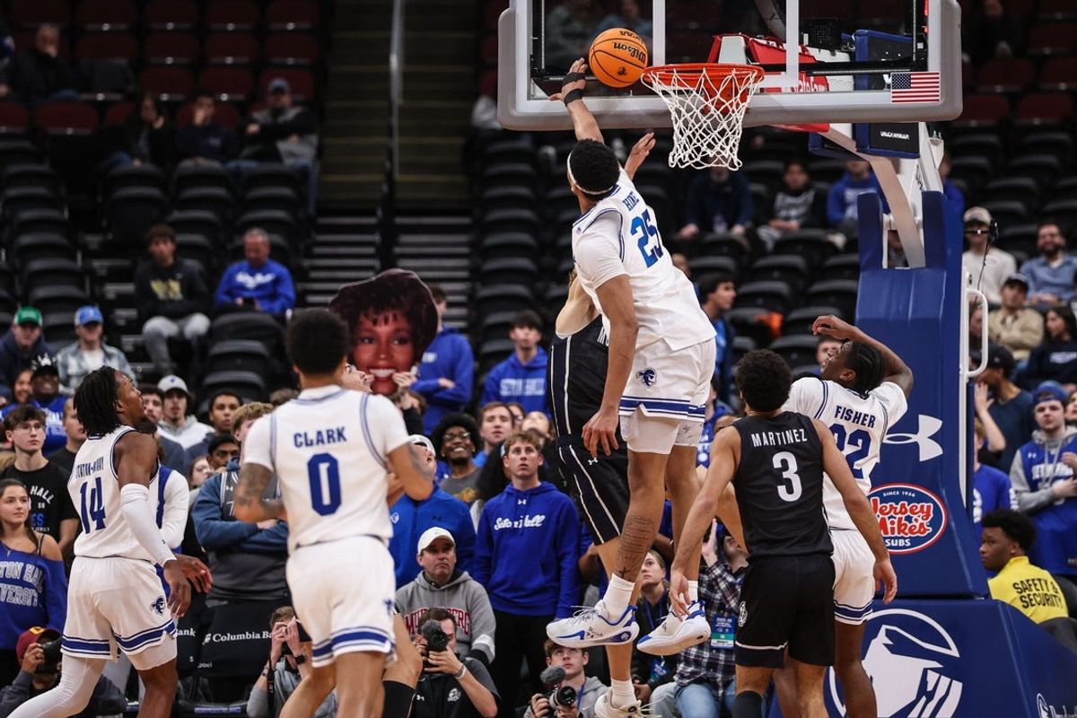 Nov 13, 2025; Newark, New Jersey, USA; Seton Hall Pirates center Najai Hines (25) blocks a shot by during the second half against the Monmouth Fighting Scots at Prudential Center. Mandatory Credit: Vincent Carchietta-Imagn Images