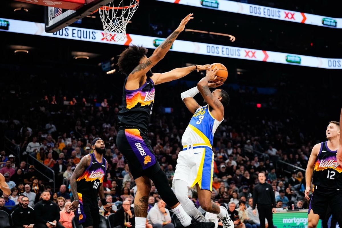 Nov 13, 2025; Phoenix, Arizona, USA;  Phoenix Suns forward Isaiah Livers (18) blocks a shot by Indiana Pacers guard Monte Morris (3) at Mortgage Matchup Center. Mandatory Credit: Arianna Grainey-Imagn Images