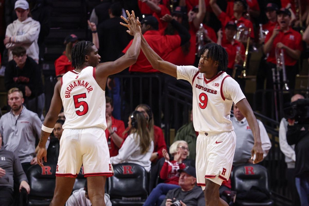 Nov 14, 2025; Piscataway, New Jersey, USA; Rutgers Scarlet Knights forward Dylan Grant (9) celebrates with guard Darren Buchanan Jr. (5) after a basket against the Lehigh Mountain Hawks during the first half at Jersey Mike's Arena. Mandatory Credit: Vincent Carchietta-Imagn Images