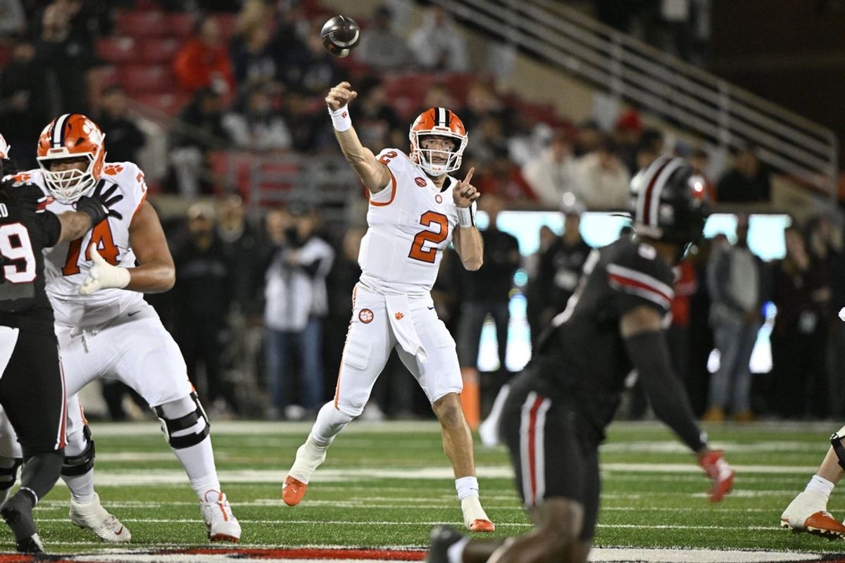 Nov 14, 2025; Louisville, Kentucky, USA;  Clemson Tigers quarterback Cade Klubnik (2) throws a pass against the Louisville Cardinals during the first half at L&N Federal Credit Union Stadium. Mandatory Credit: Jamie Rhodes-Imagn Images