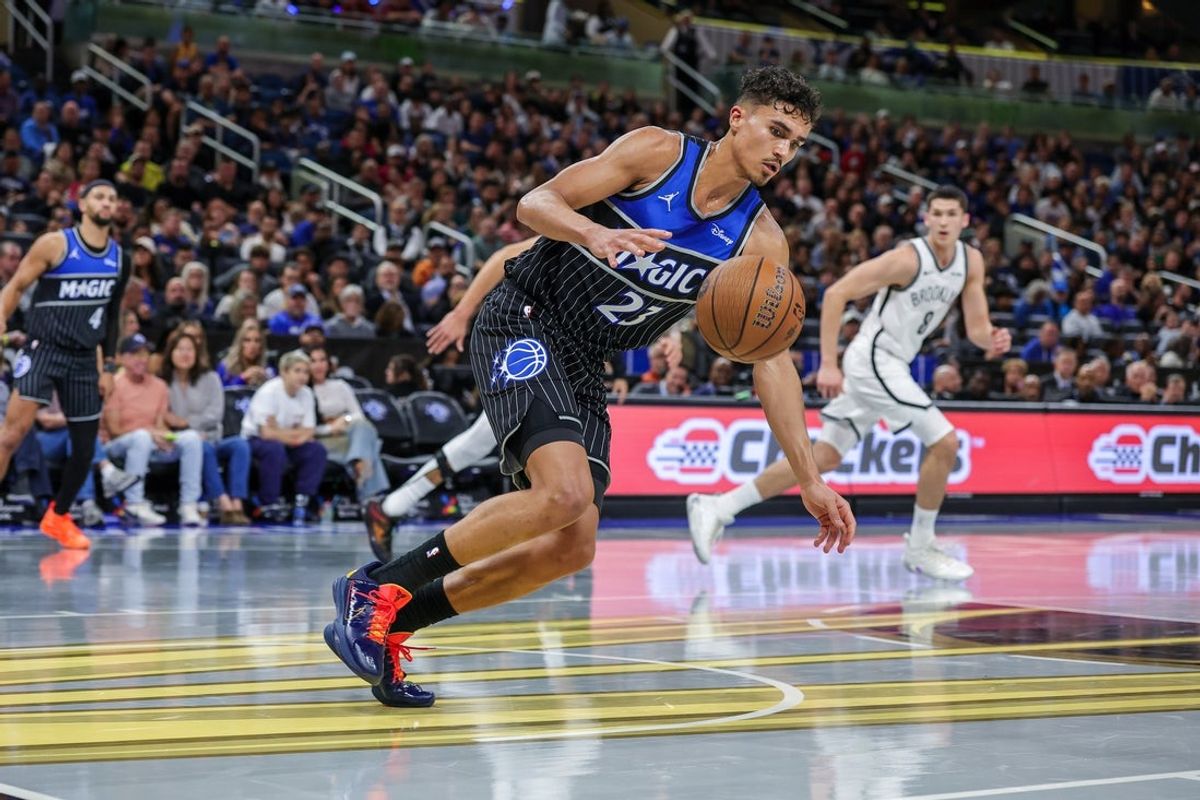 Nov 14, 2025; Orlando, Florida, USA; Orlando Magic forward Tristan da Silva (23) grabs the rebound during the second quarter against the Brooklyn Nets at Kia Center. Mandatory Credit: Mike Watters-Imagn Images