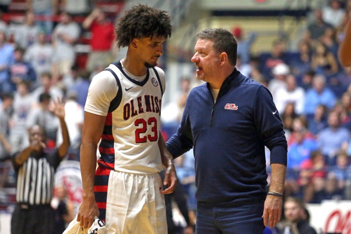 Nov 14, 2025; Oxford, Mississippi, USA; Mississippi Rebels head coach Chris Beard talks with guard Patton Pinkins (23) during the second half against the Cal State Bakersfield Roadrunners at C.M. ’Tad’ Smith Coliseum. Mandatory Credit: Petre Thomas-Imagn Images