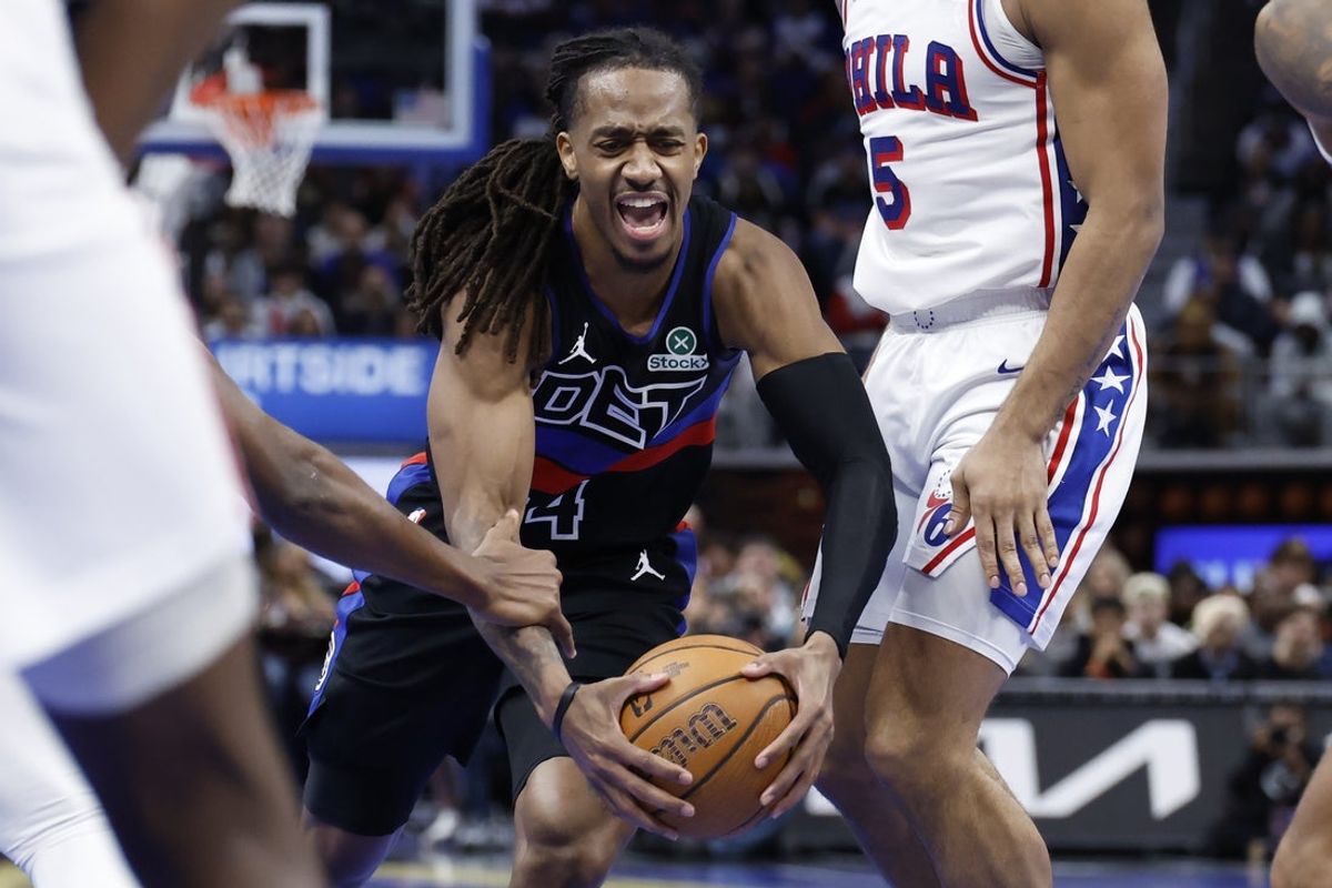 Nov 14, 2025; Detroit, Michigan, USA;  Detroit Pistons guard Daniss Jenkins (24) dribbles 2g against the Philadelphia 76ers at Little Caesars Arena. Mandatory Credit: Rick Osentoski-Imagn Images
