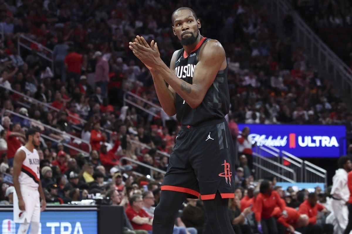 Nov 14, 2025; Houston, Texas, USA;  Houston Rockets forward Kevin Durant (7) claps after a play during the fourth quarter against the Portland Trail Blazers at Toyota Center. Mandatory Credit: Troy Taormina-Imagn Images