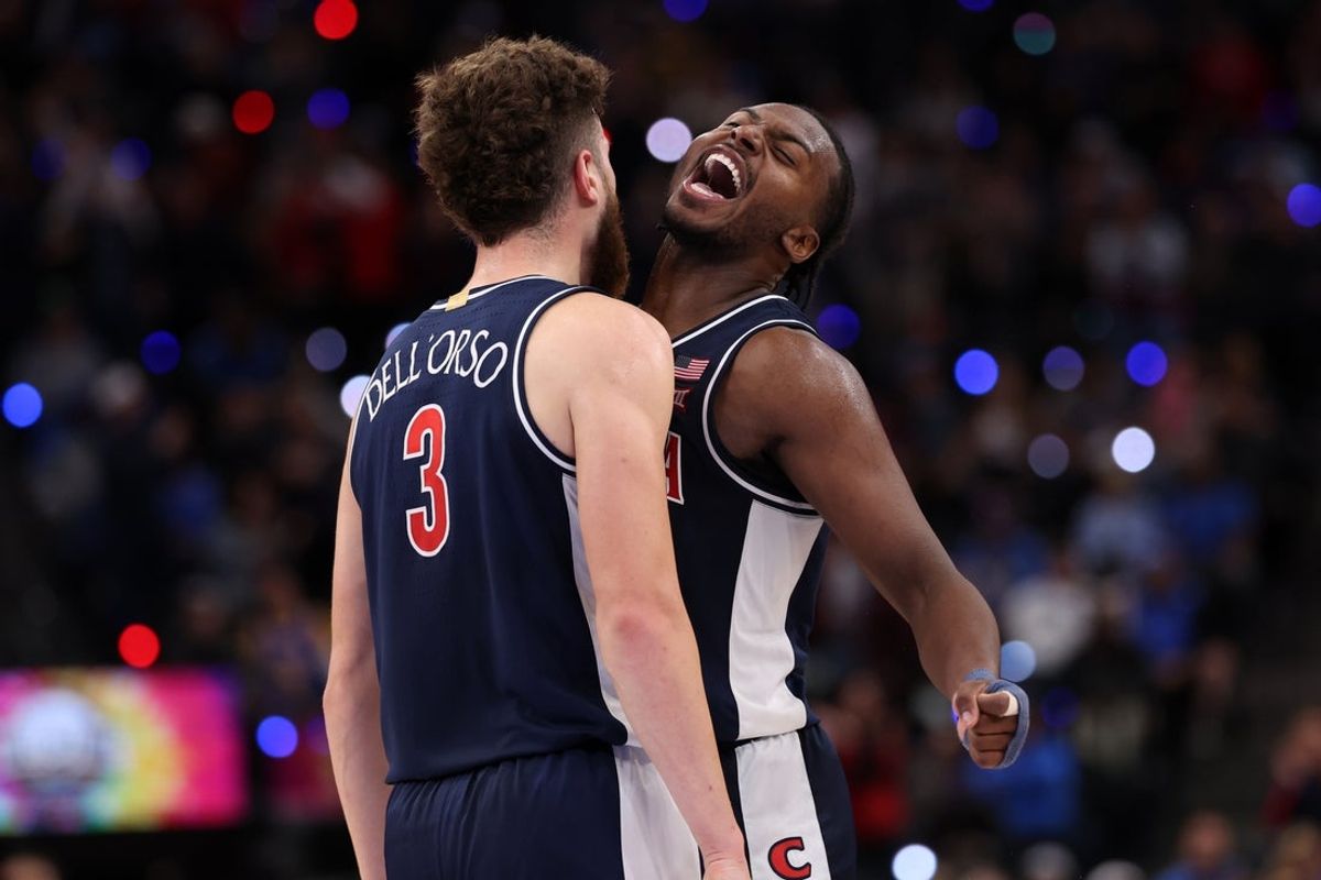 Nov 14, 2025; Inglewood, California, USA;  Arizona Wildcats guard Anthony Dell'Orso (3) celebrates with guard Jaden Bradley (0) during the second half of the Hall of Fame Series game against the UCLA Bruins at Intuit Dome. Mandatory Credit: Kiyoshi Mio-Imagn Images