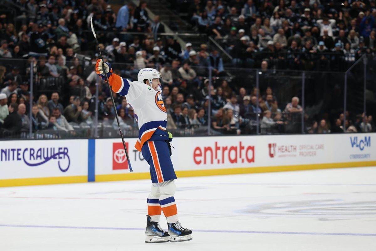 Nov 14, 2025; Salt Lake City, Utah, USA; New York Islanders defenseman Matthew Schaefer (48) reacts to scoring the game winning goal against the Utah Mammoth during overtime at Delta Center. Mandatory Credit: Rob Gray-Imagn Images