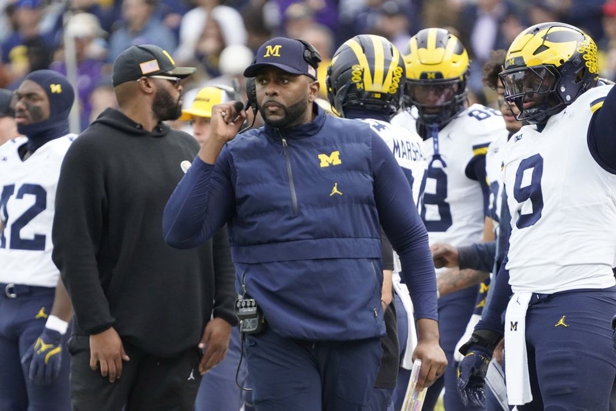 Nov 15, 2025; Chicago, Illinois, USA; Michigan Wolverines head coach Sherrone Moore on the sidelines against the Northwestern Wildcats during the first half at Wrigley Field. Mandatory Credit: David Banks-Imagn Images