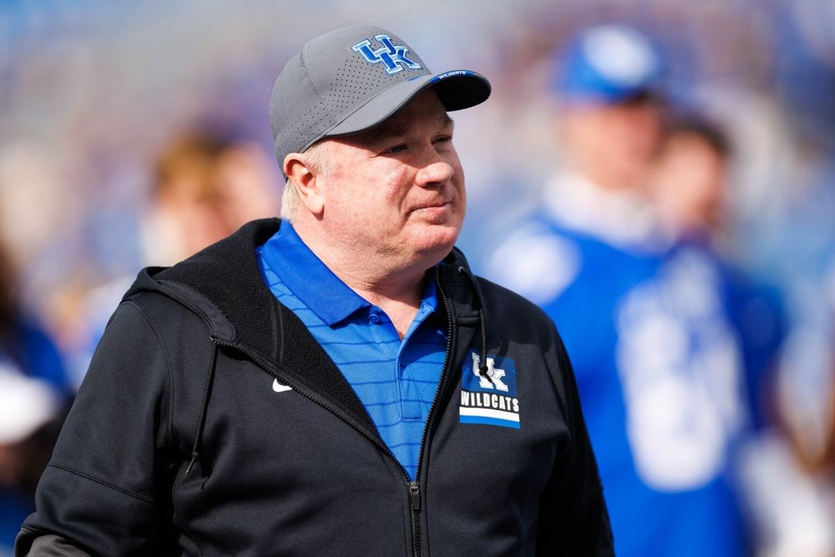 Nov 15, 2025; Lexington, Kentucky, USA; Kentucky Wildcats head coach Mark Stoops greets players during the senior day celebration before the game against the Tennessee Tech Golden Eagles at Kroger Field. Mandatory Credit: Jordan Prather-Imagn Images