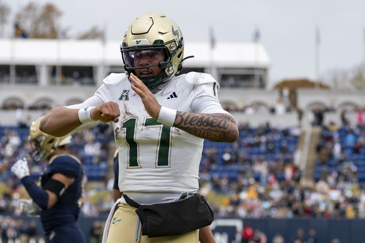 Nov 15, 2025; Annapolis, Maryland, USA; South Florida Bulls quarterback Byrum Brown (17) reacts after scoring a touchdown against the Navy Midshipmen  during the second half at Navy-Marine Corps Memorial Stadium. Navy Midshipmen defeated South Florida Bulls 41-28. Mandatory Credit: Tommy Gilligan-Imagn Images