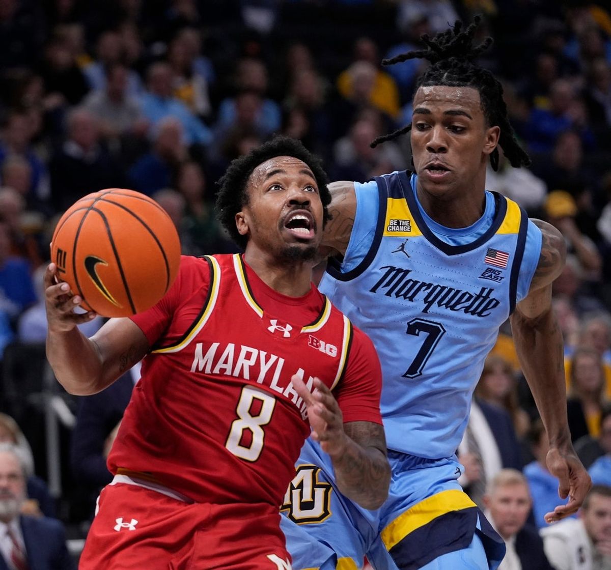 Maryland Terrapins guard David Coit (8) drives to the basket pass Marquette Golden Eagles guard Zaide Lowery (7) during the second half of the game on Saturday November 15, 2025 at Fiserv Forum in Milwaukee, Wisconsin.