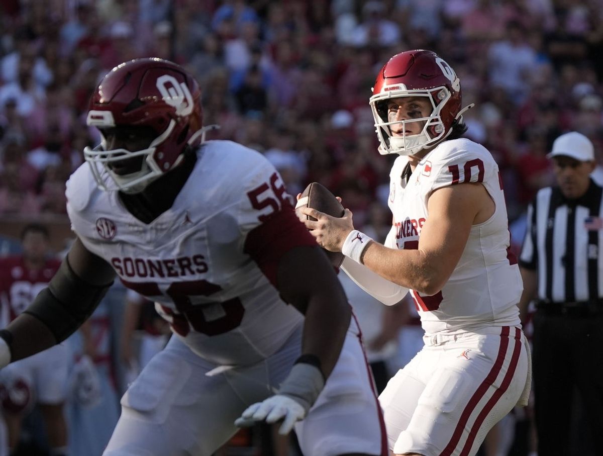 Nov 15, 2025; Tuscaloosa, Alabama, USA;  Oklahoma Sooners quarterback John Mateer (10) drops back to pass against the Alabama Crimson Tide at Saban Field at Bryant-Denny Stadium. Mandatory Credit: Gary Cosby-Imagn Images