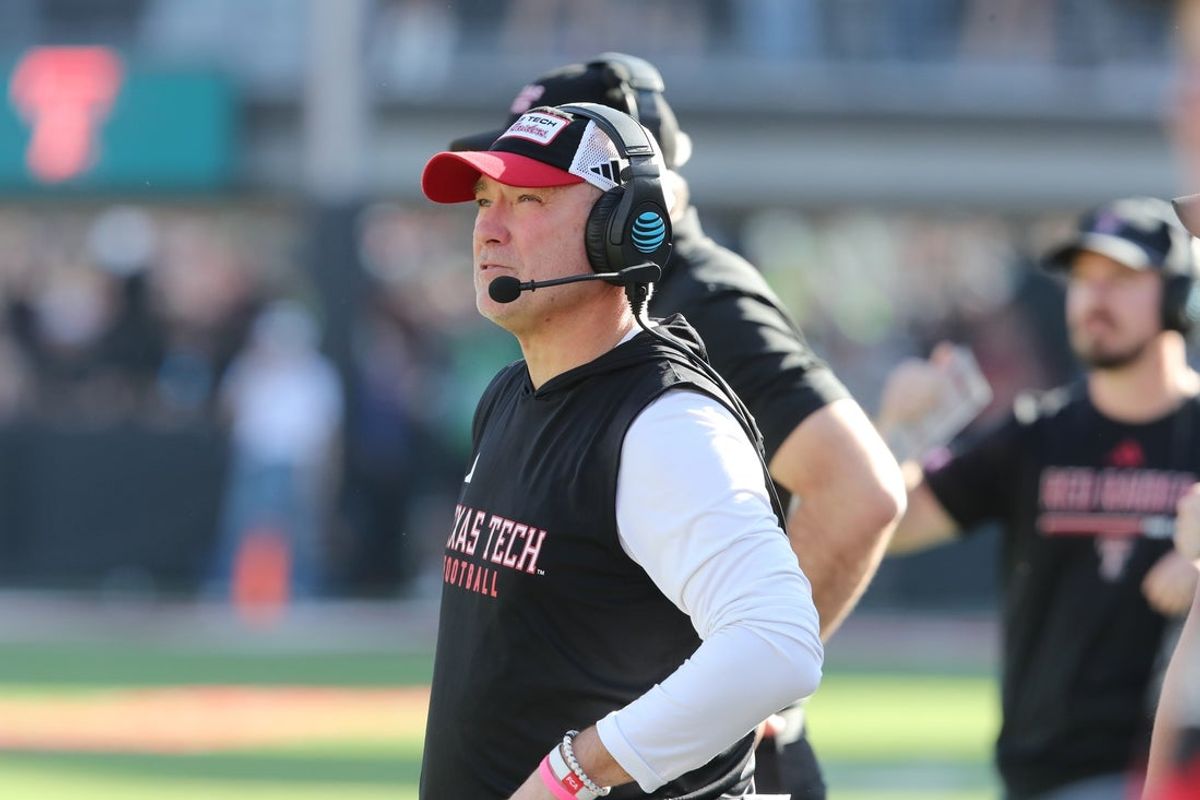 Nov 15, 2025; Lubbock, Texas, USA;  Texas Tech Red Raiders head coach Joey McGuire watches the big screen in the first half against the Central Florida Knights at Jones AT&T Stadium. Mandatory Credit: Michael C. Johnson-Imagn Images