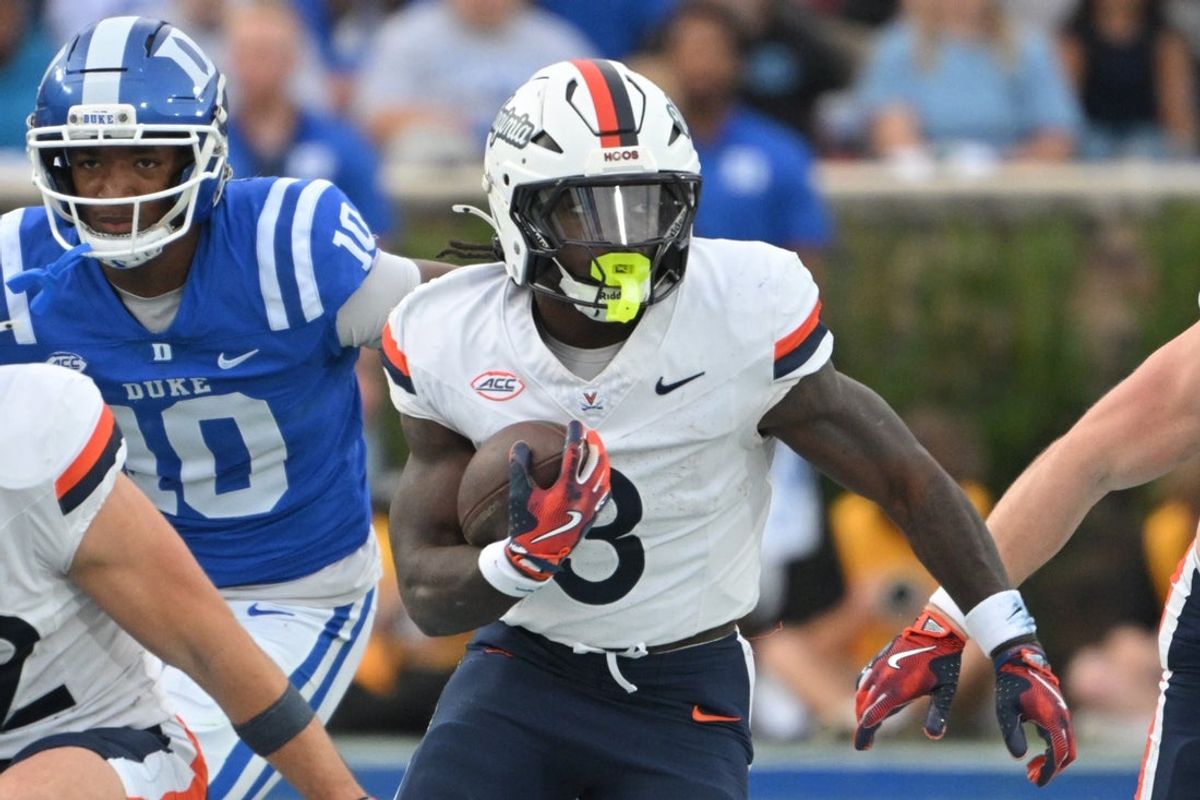 Nov 15, 2025; Durham, North Carolina, USA;  Virginia Cavaliers running back J'Mari Taylor (3) runs the ball during the first quarter against the Duke Blue Devils at Wallace Wade Stadium. Mandatory Credit: Zachary Taft-Imagn Images