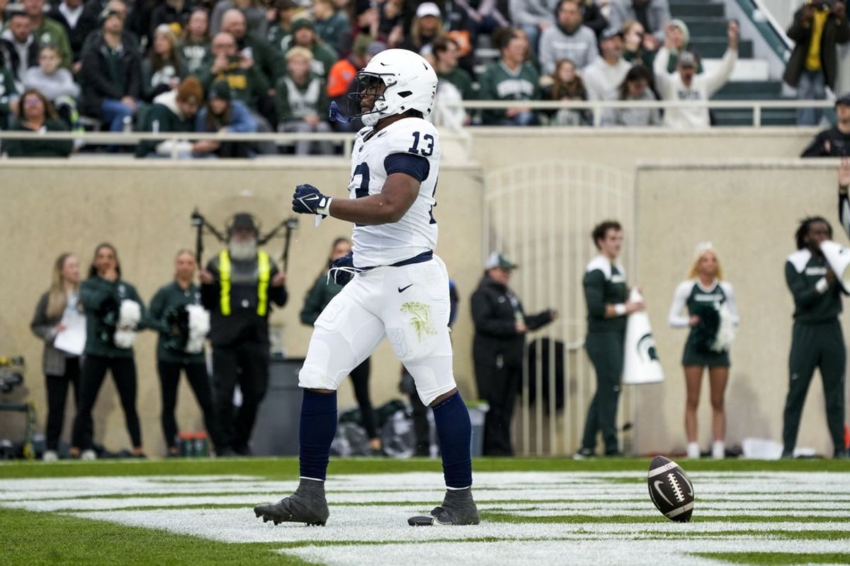 Nov 15, 2025; East Lansing, Michigan, USA; Penn State running back Kaytron Allen (13) celebrates a touchdown at Spartan Stadium. Mandatory Credit: Brendan Mullin-Imagn Images