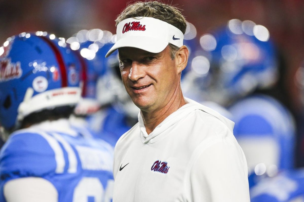 Nov 15, 2025; Oxford, Mississippi, USA; Mississippi Rebels head coach Lane Kiffin watches pregame warmups against the Florida Gators at Vaught-Hemingway Stadium. Mandatory Credit: Petre Thomas-Imagn Images
