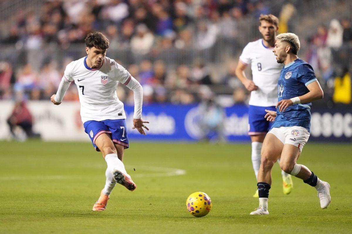 Nov 15, 2025; Chester, Pennsylvania, USA; United States midfielder Gio Reyna (7) passes the ball against Paraguay in the first half at Subaru Park. Mandatory Credit: Kyle Ross-Imagn Images