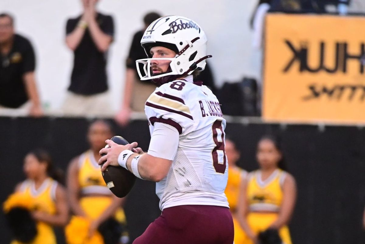 Texas State Bobcats quarterback Brad Jackson (8) looks to pass against the Southern Miss Golden Eagles at M.M. Roberts Stadium in Hattiesburg,Miss, on Nov. 15, 2025.