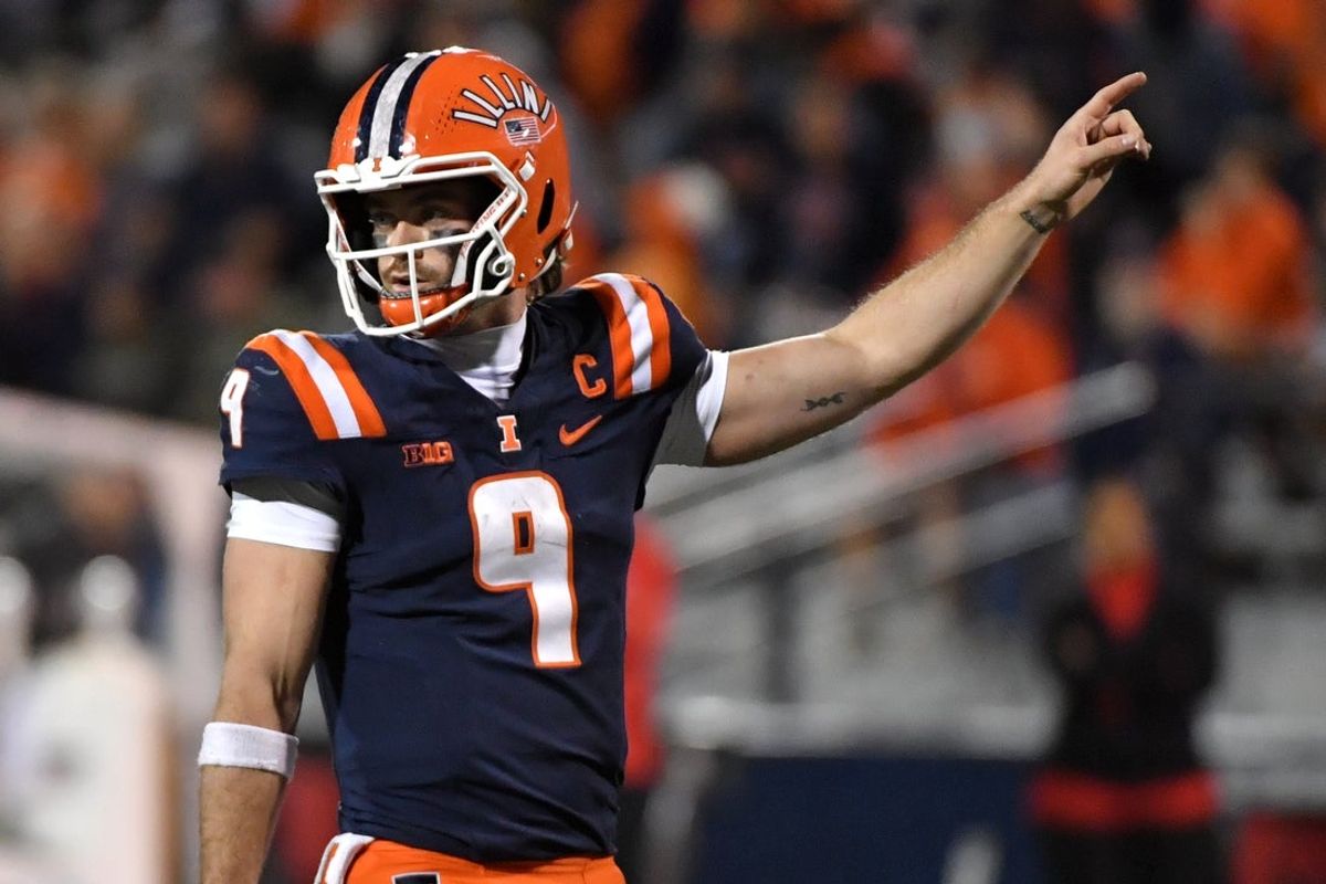 Nov 15, 2025; Champaign, Illinois, USA; Illinois Fighting Illini quarterback Luke Altmyer (9) reacts on a first down call during the second half against the Maryland Terrapins at Memorial Stadium. Mandatory Credit: Ron Johnson-Imagn Images