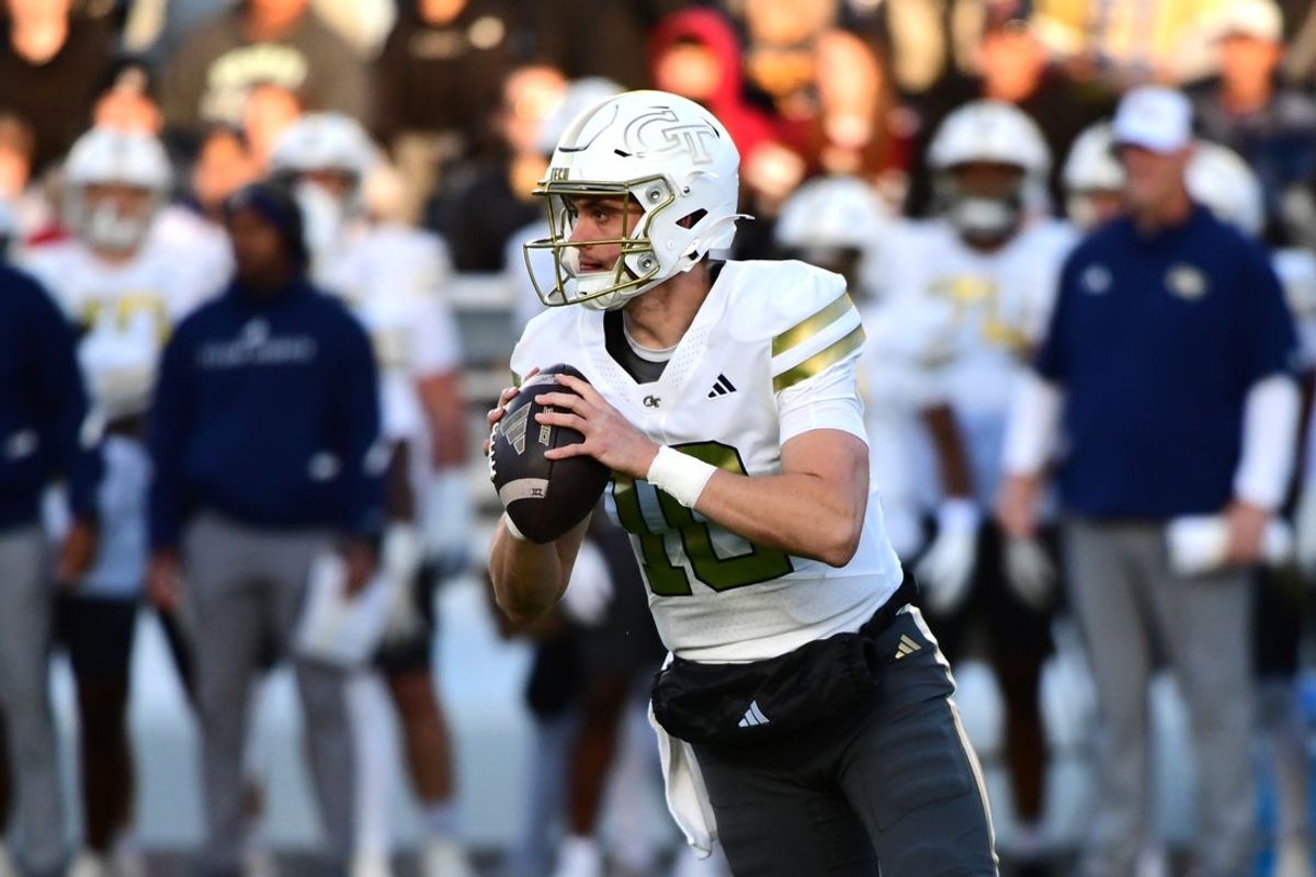 Nov 15, 2025; Chestnut Hill, Massachusetts, USA; Georgia Tech Yellow Jackets quarterback Haynes King (10) looks to pass the ball during the first half against the Boston College Eagles at Alumni Stadium. Mandatory Credit: Bob DeChiara-Imagn Images