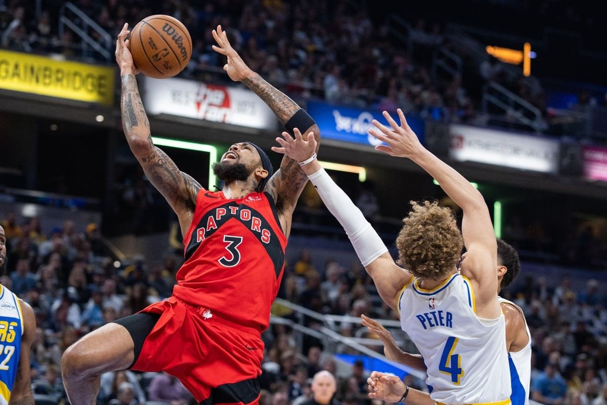 Nov 15, 2025; Indianapolis, Indiana, USA; Toronto Raptors forward Brandon Ingram (3) shoots the ball while Indiana Pacers guard Taelon Peter (4) defends in the first half at Gainbridge Fieldhouse. Mandatory Credit: Trevor Ruszkowski-Imagn Images