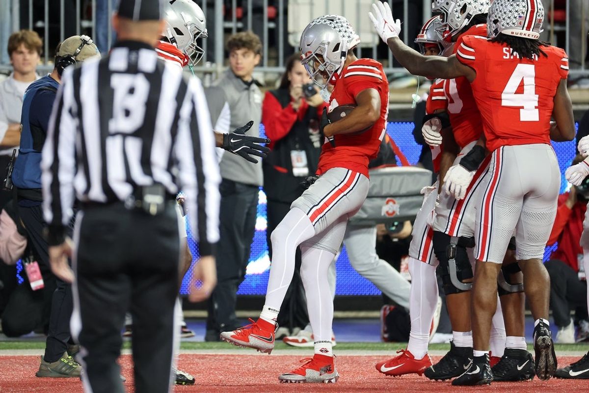 Nov 15, 2025; Columbus, Ohio, USA;  Ohio State Buckeyes wide receiver Bryson Rodgers (13) celebrates his touchdown catch during the second quarter against the UCLA Bruins at Ohio Stadium. Mandatory Credit: Joseph Maiorana-Imagn Images