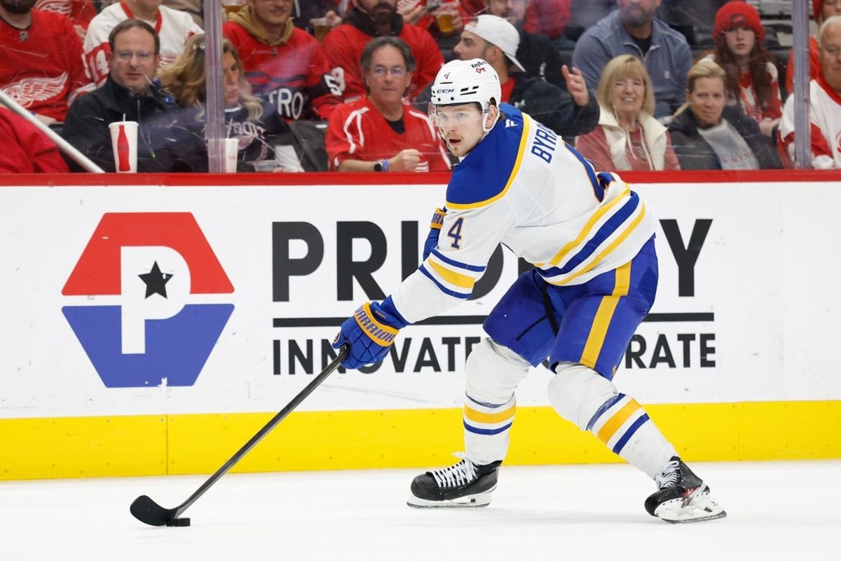 Nov 15, 2025; Detroit, Michigan, USA;  Buffalo Sabres defenseman Bowen Byram (4) skates with the puck in the third period against the Detroit Red Wings at Little Caesars Arena. Mandatory Credit: Rick Osentoski-Imagn Images