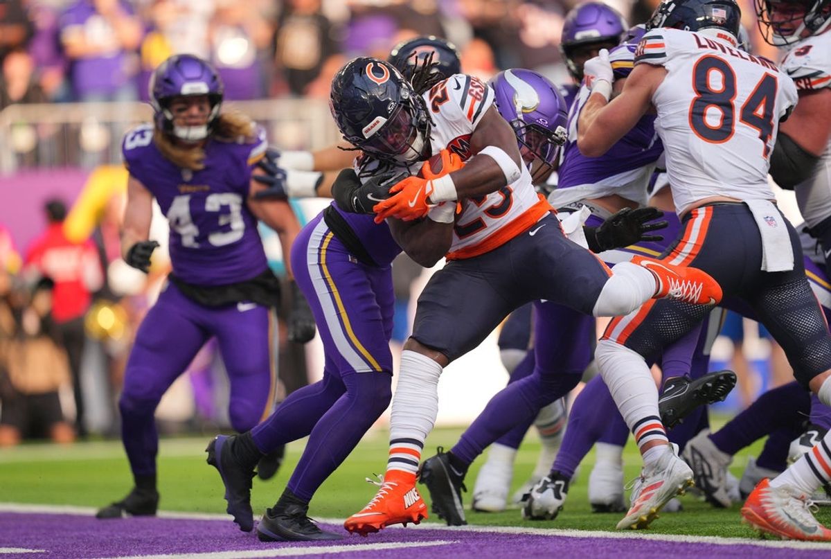 Nov 16, 2025; Minneapolis, Minnesota, USA; Chicago Bears running back Kyle Monangai (25) runs for a touchdown during the second quarter against the Minnesota Vikings at U.S. Bank Stadium. Mandatory Credit: Brad Rempel-Imagn Images