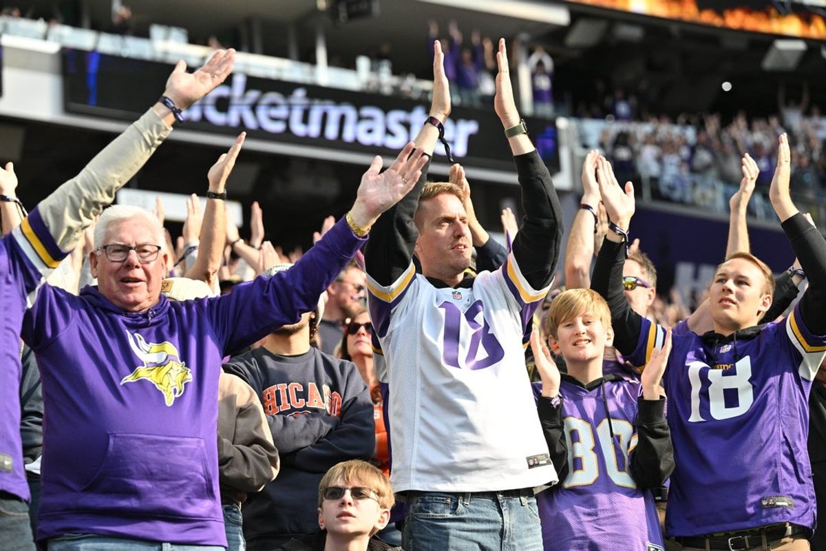 Nov 16, 2025; Minneapolis, Minnesota, USA; Minnesota Vikings fans perform the “Skol” prior to a game against the Chicago Bears at U.S. Bank Stadium. Mandatory Credit: Jeffrey Becker-Imagn Images
