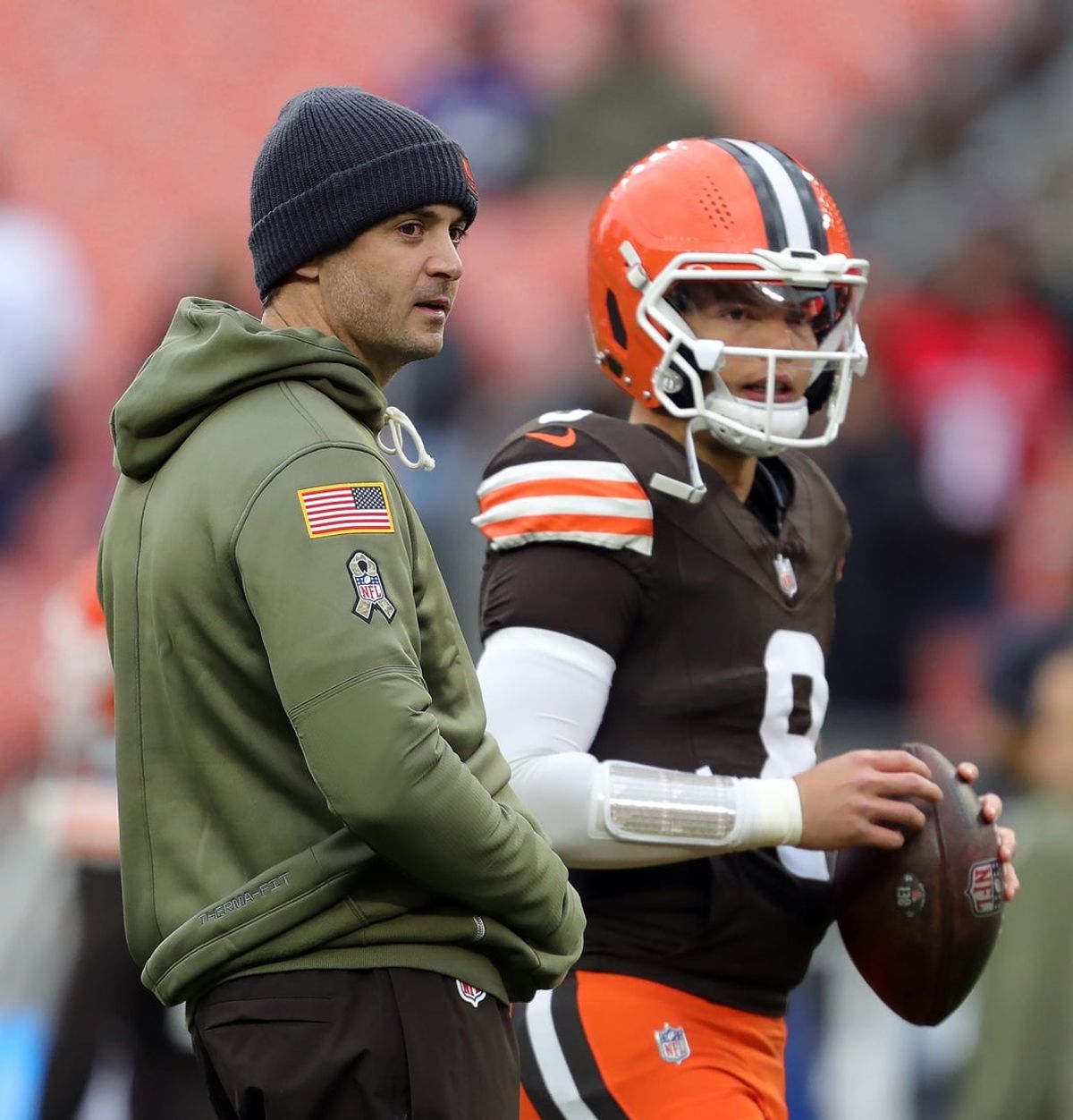 Cleveland Browns offensive coordinator Tommy Rees watches quarterback Dillon Gabriel (8) warm up before an NFL football game at Huntington Bank Field, Nov. 16, 2025, in Cleveland, Ohio.