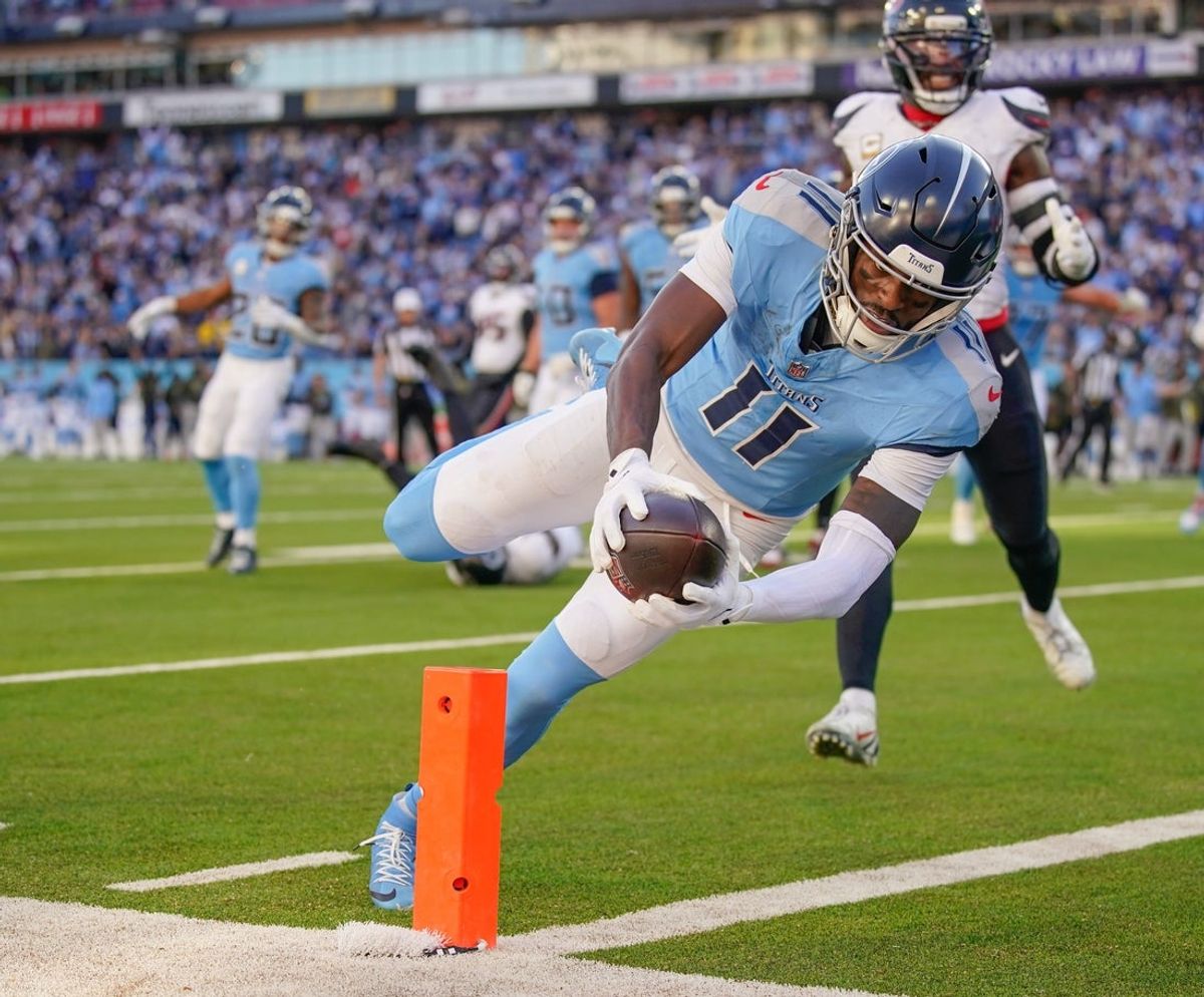 Tennessee Titans wide receiver Van Jefferson (11) sails into the end zone during the fourth quarter against the Houston Texans at Nissan Stadium in Nashville, Tenn., Sunday, Nov. 16, 2025.