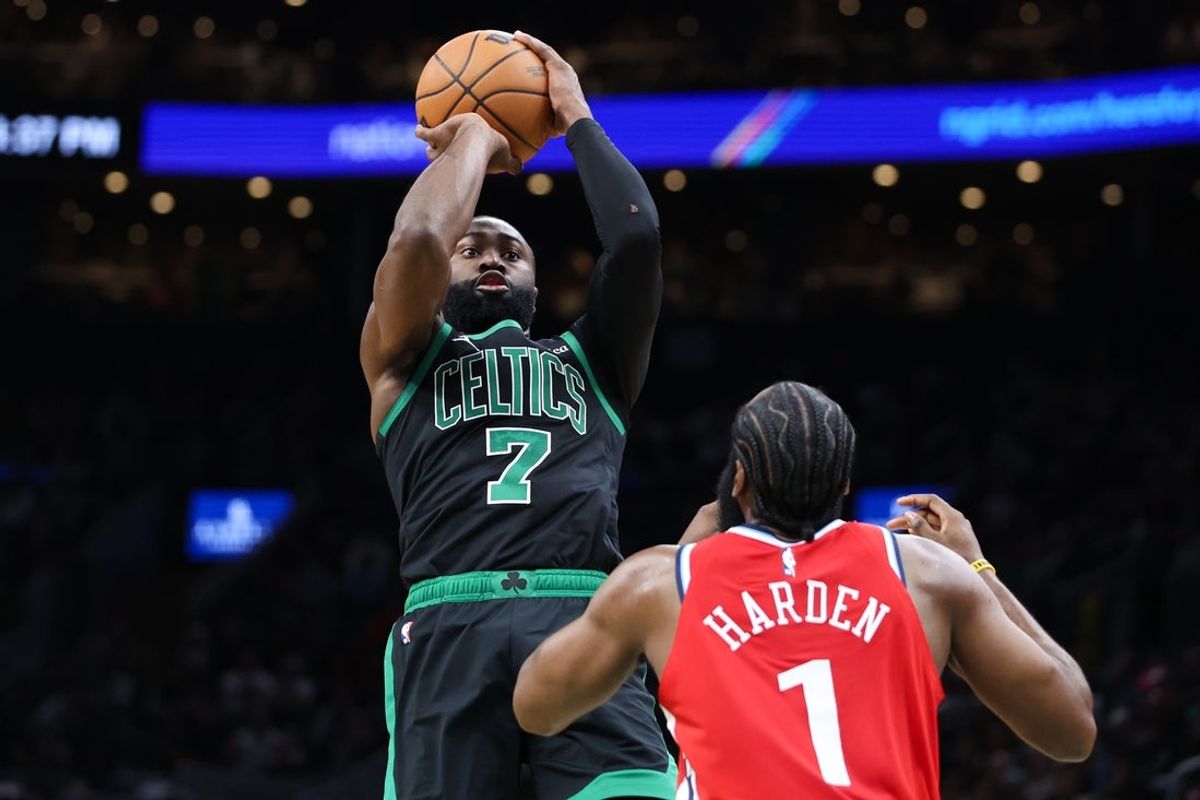 Nov 16, 2025; Boston, Massachusetts, USA; Boston Celtics forward Jaylen Brown (7) shoots during the first half defended by Los Angeles Clippers guard James Harden (1) at TD Garden. Mandatory Credit: Paul Rutherford-Imagn Images