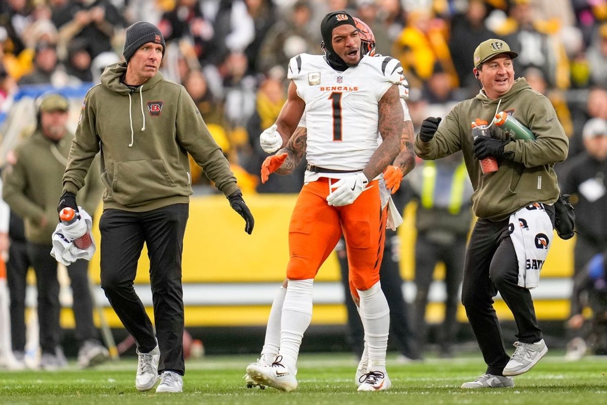 Cincinnati Bengals wide receiver Ja'Marr Chase (1) is pushed out of a skirmish at midfield in the fourth quarter of the NFL Week 11 game between the Pittsburgh Steelers and the Cincinnati Bengals at Acrisure Stadium in Pittsburgh on Sunday, Nov. 16, 2025. The Bengals lost 34-12.