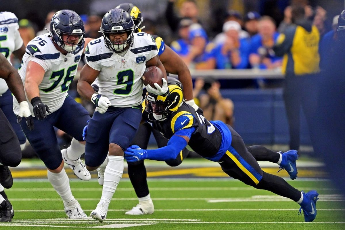 Nov 16, 2025; Inglewood, California, USA; Seattle Seahawks running back Kenneth Walker III (9) runs the ball against the Los Angeles Rams during the first half at SoFi Stadium. Mandatory Credit: Jayne Kamin-Oncea-Imagn Images