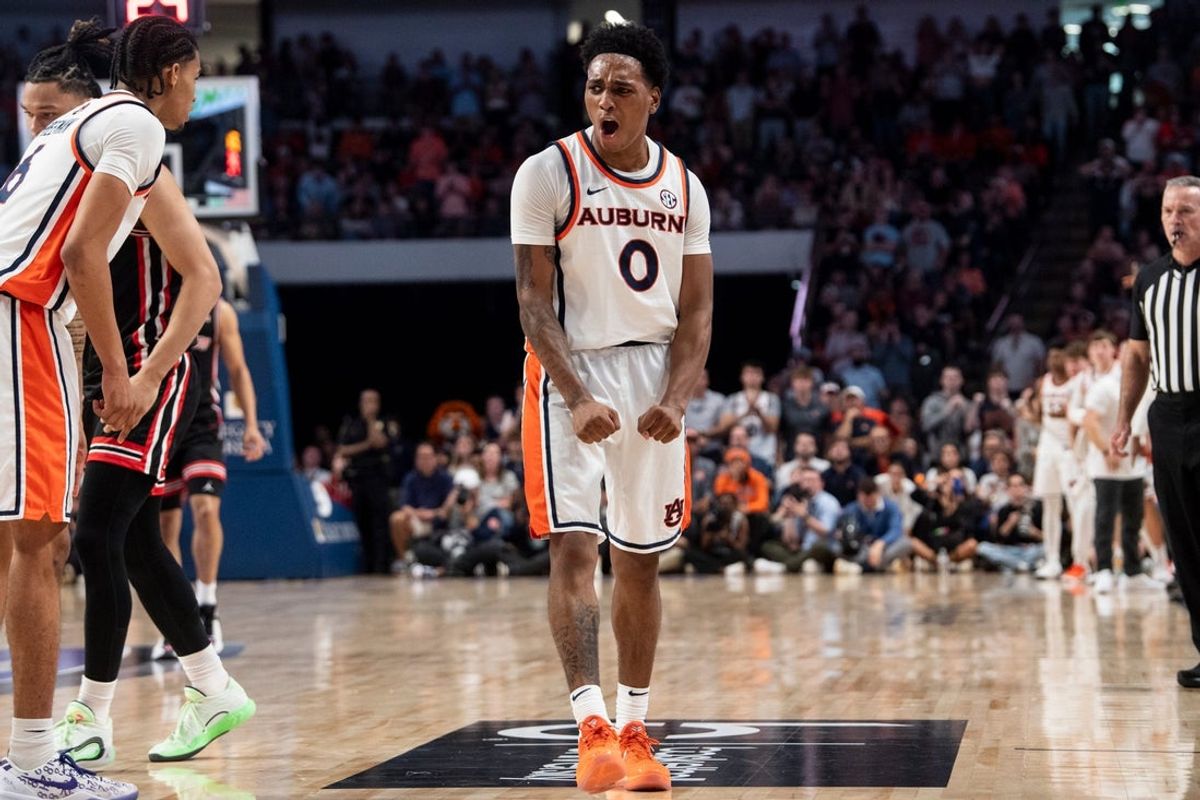 Auburn Tigers guard Tahaad Pettiford (0) celebrates a play as Auburn Tigers take on the Houston Cougars at Legacy Arena in Birmingham, Ala. on Sunday, Nov. 16, 2025. Houston Cougars defeated Auburn Tigers 73-72.