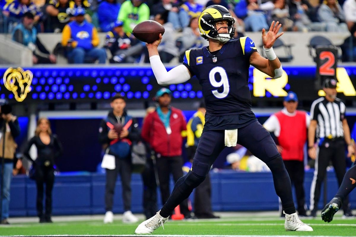 Nov 16, 2025; Inglewood, California, USA; Los Angeles Rams quarterback Matthew Stafford (9) throws a during the second half against the Seattle Seahawks at SoFi Stadium. Mandatory Credit: Gary A. Vasquez-Imagn Images