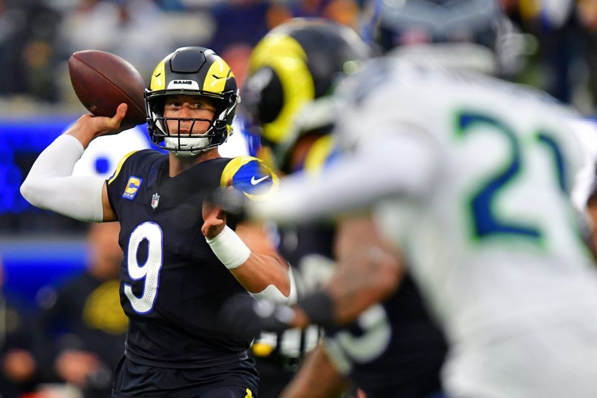 Nov 16, 2025; Inglewood, California, USA; Los Angeles Rams quarterback Matthew Stafford (9) throws a pass during the second half against the Seattle Seahawks at SoFi Stadium. Mandatory Credit: Gary A. Vasquez-Imagn Images